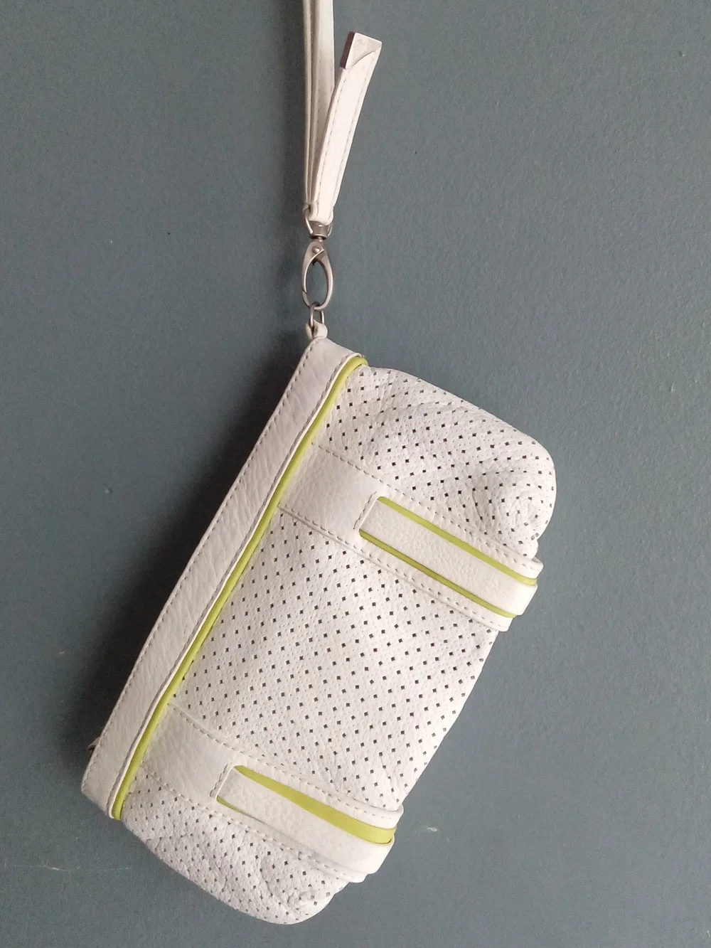 White Perforated Faux Leather Wristlet Clutch with Lime Green Trim and Buckles